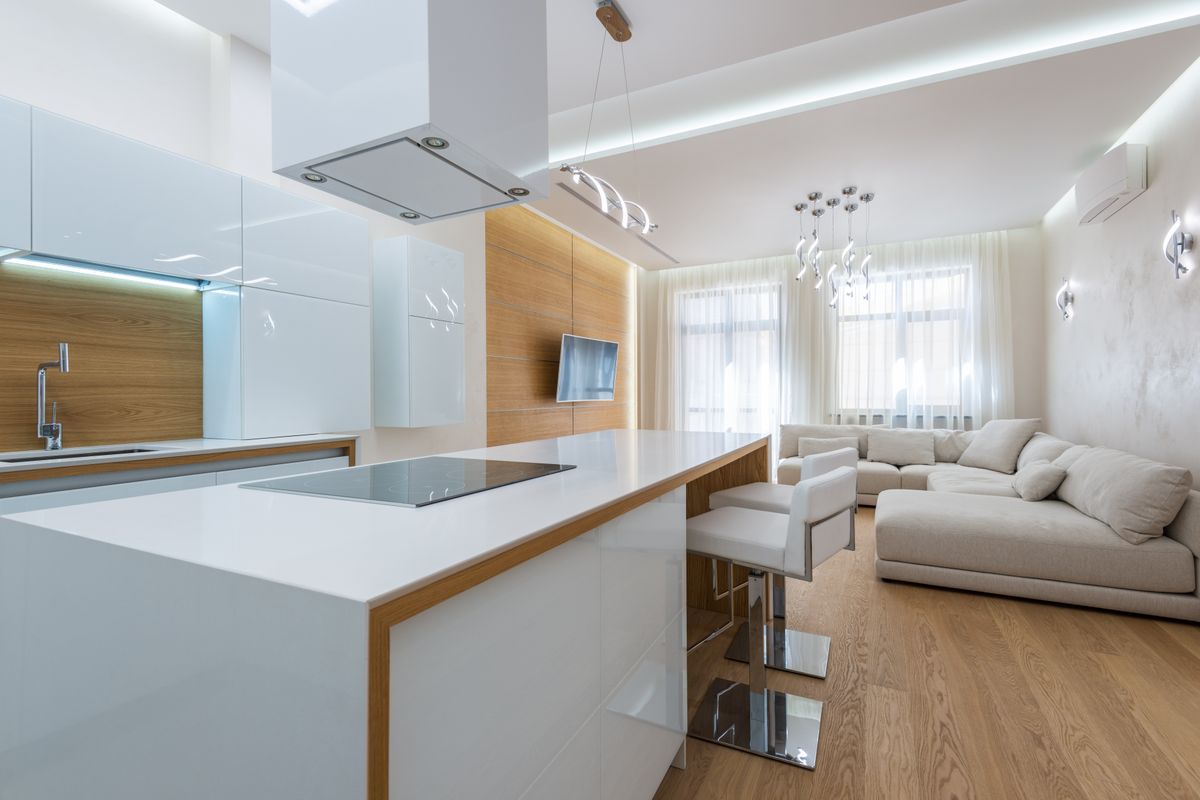 Kitchen counter opening onto a light living area